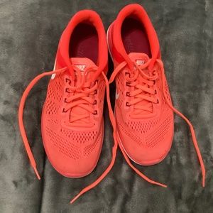 Nike coral running shoes
